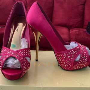 Platform peep toe heels.